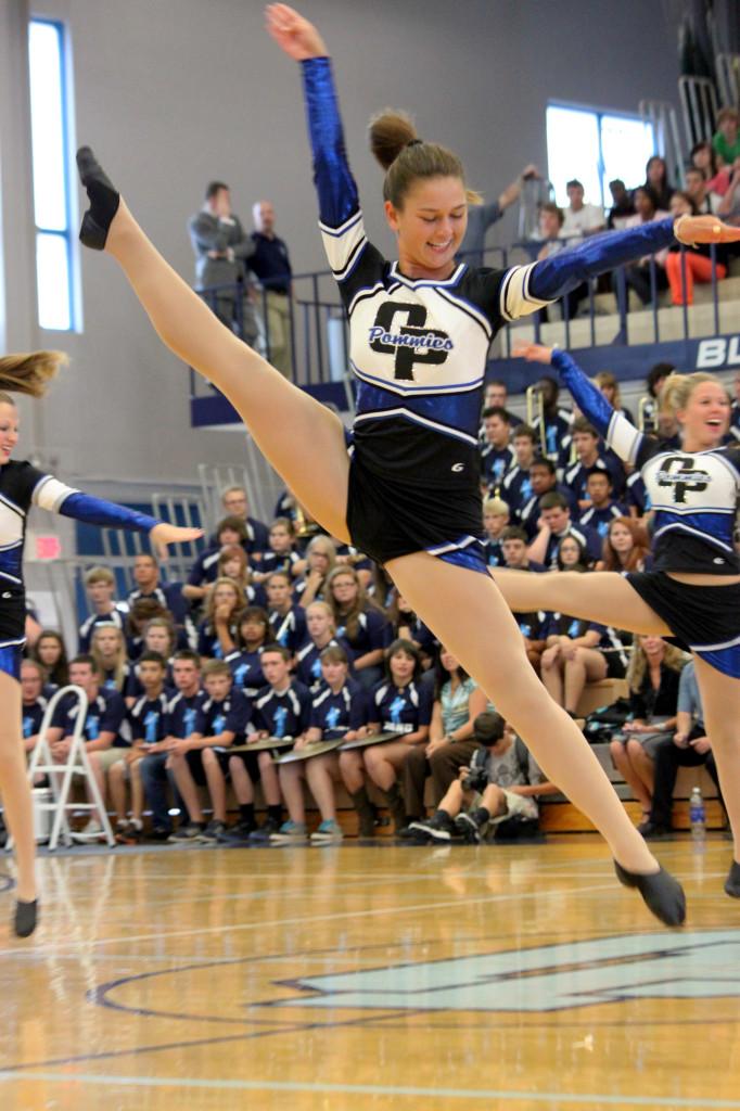 At the back to school assembly on August 21, sophomore Tiffany Grazda does a tilt kick during the Pommies’ performance. Grazda has been dancing since she was 3 years old. “It was really neat to see the freshman on the squad experience their first performance for the high school,” Grazda said.