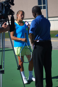 After being selected for team of the week on Fox 4 news, senior Emily Ballard gets interviewed by Fox 4’s sports anchor, Al Wallace, about her passion for Oak Park tennis on Wednesday, Oct. 9. Seeing how happy it made Coach [Tana] Stock was the best part for Ballard. "The season went great. We played a lot of tough teams which made for some fun competition," Ballard said.