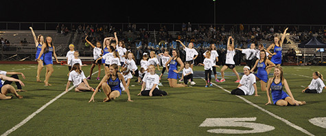 Little Pommies perform at game