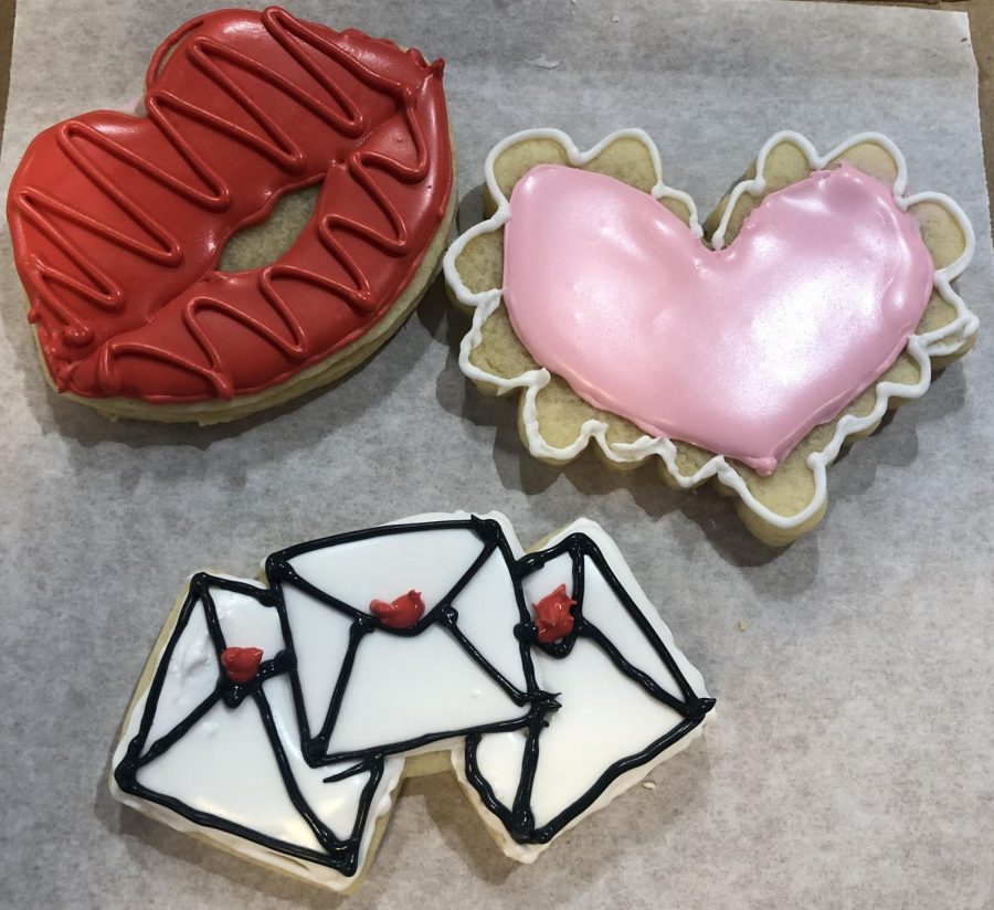 Sweet tooth. Cookies made in a class taught by Carly at “Cookies by Carly”. During a Valentines Day workshop, participants learned the basics of cookie decorating on these 3 cookies. “ These cookies are amazing” said Byrum