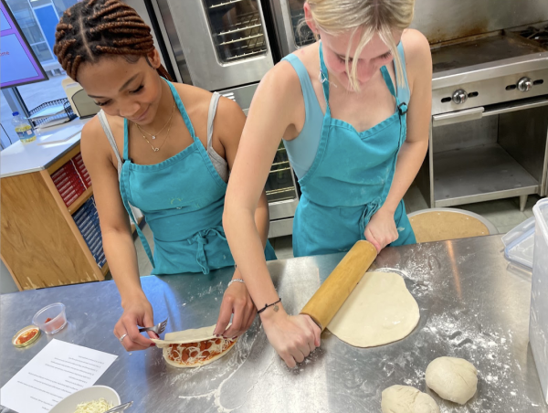 Sophomores Diana Jones and Mary Claire Hill make calzones during their time-management lab in Prostart I.