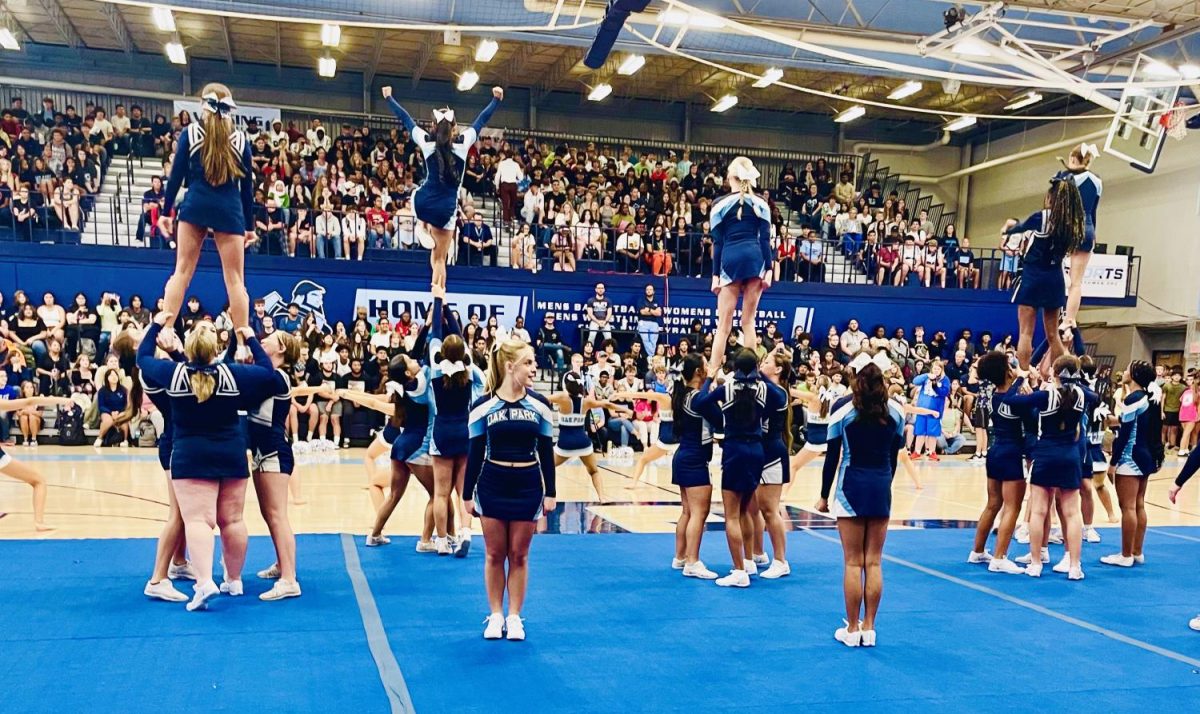 Cheerleaders perform at the back-to-school assembly on Friday, Aug. 30.