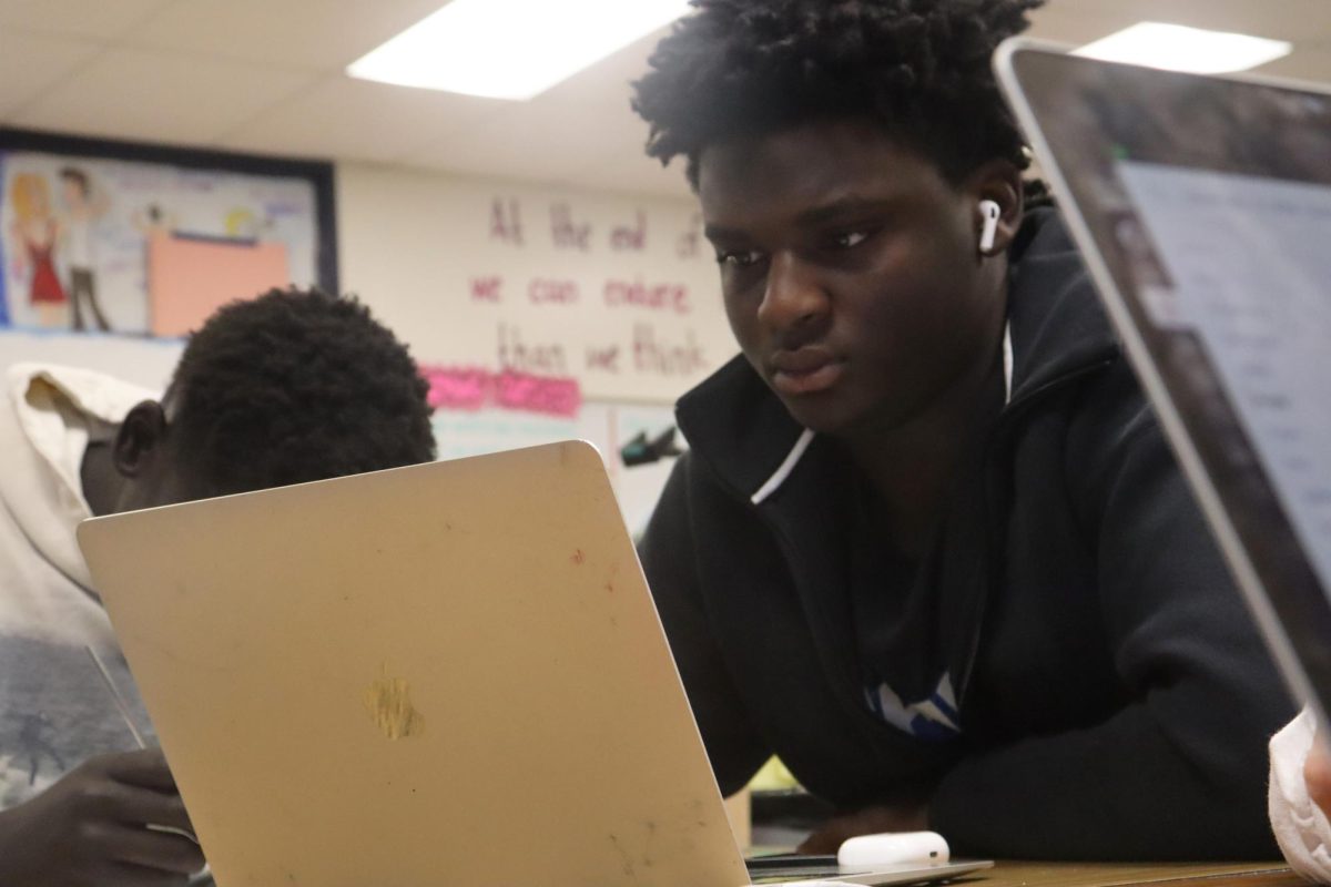 Sophomore Makato Williamson finishes up and revises his art project after weeks of progress and planning on Monday, Oct. 28. “I just making sure everything is all good before I submit anything.”