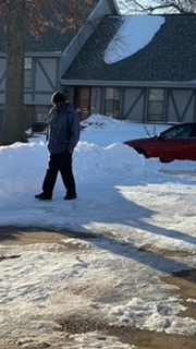 Dad walks in the snow to see if any of it melted. He had just came back from work. He said, “it was scary driving to work; I didn’t feel safe driving.”
