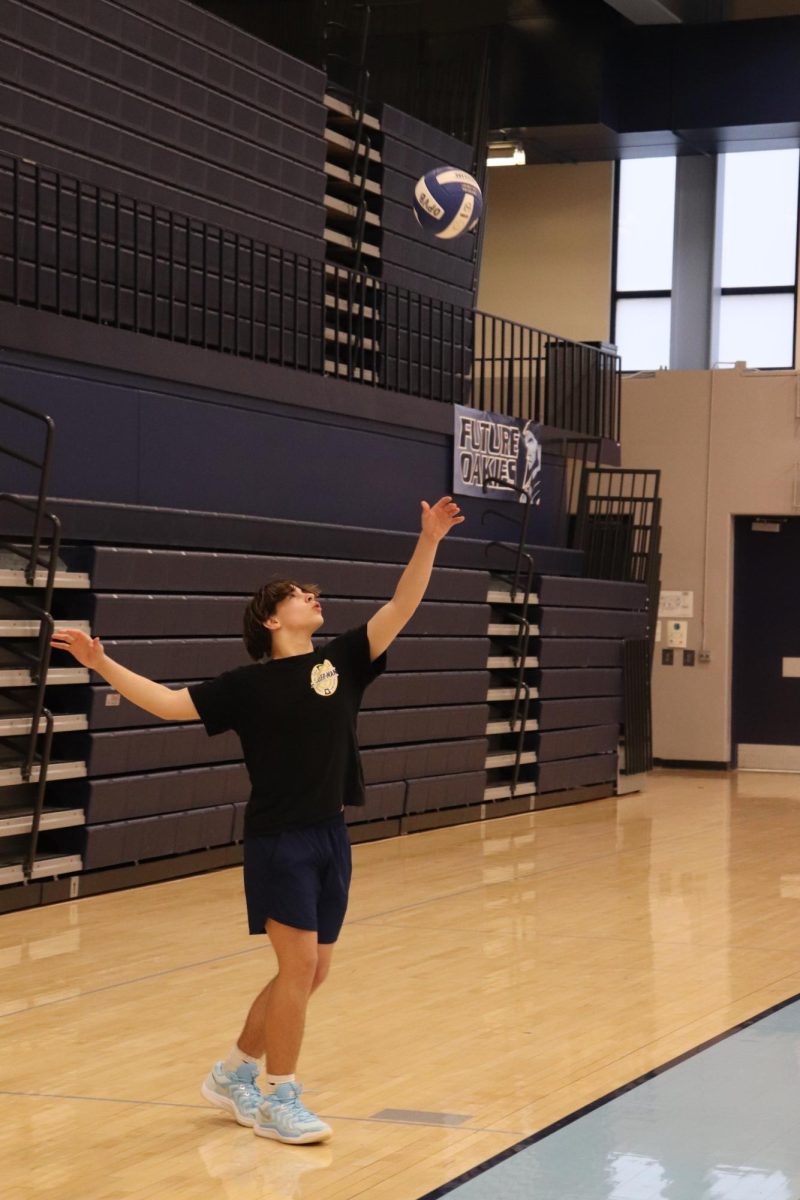 Here they were practicing serves which is a huge part of the game. It starts every point and can make or break that point. “I was trying to focus on the toss so I could get the timing right. Because if you don’t get a high enough toss, it won’t go far but if it gets to high it can mess up the placement” Holden Shields freshman