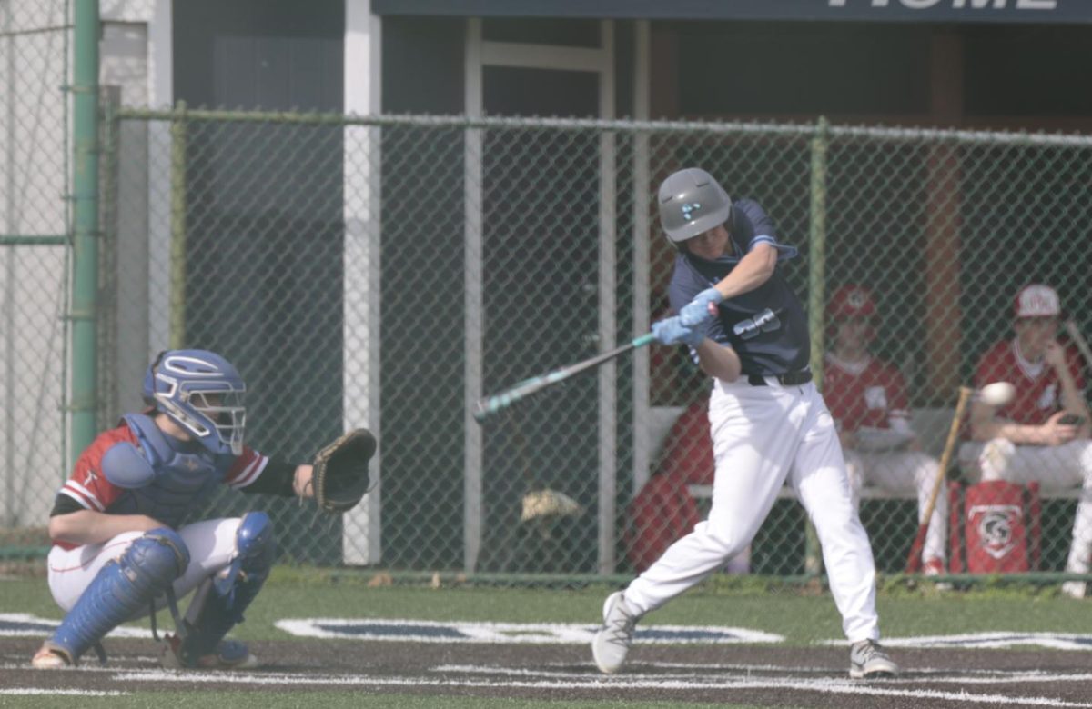 Sophomore Jonas Brest takes a swing at a ball on Wednesday, April 2, against the Park Hill Spartans . Brest has been playing baseball for 12 years. What Brest likes most about baseball is that his "teammates are easy to work with and they get along well." Oak Park Northmen took home the win against Park Hill 16-12.

Caption By Chloe Anders 