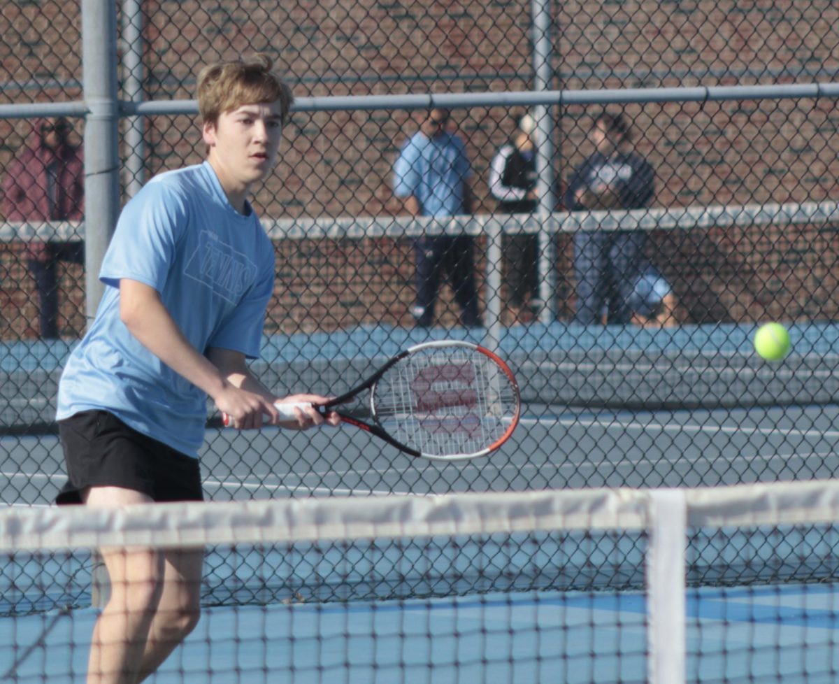 Junior Jake Blanks faces off against another Oak Park player in a challenge match at the meet on April 8. “I was confident that I could beat him,” said Blanks. However, his challenger managed to best him during the match.