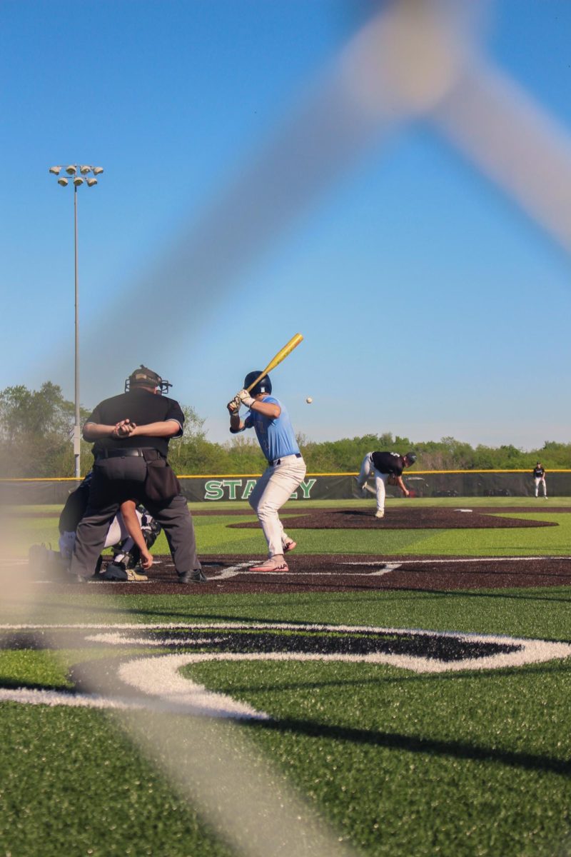 Sophomore #21, Brett Fales gets ready to hit, eyes on the ball. JV keeps their morale up after the 2-7 loss on Friday, April 24th at Staley. The team continues to put in the effort as the season comes to an end, with goals of going to state next year.